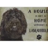 A home Labradoodle - metalen bord